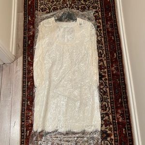 Trina truck white lace dress never worn